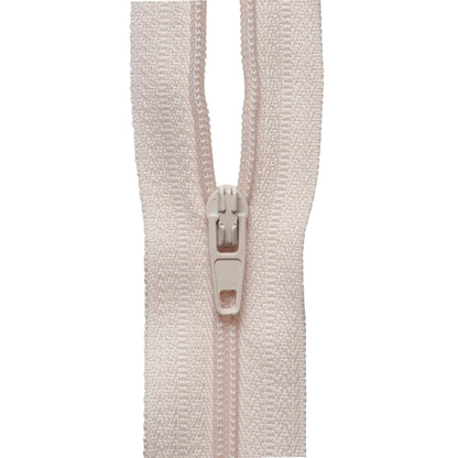 Roll of dark cream continuous nylon zip with sliders