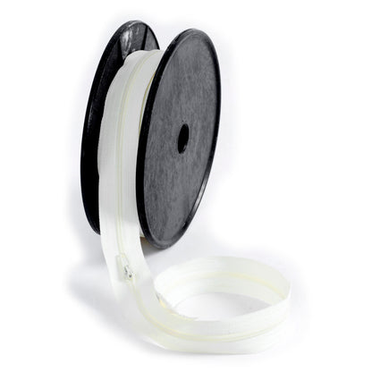 Roll of cream continuous nylon zip with sliders