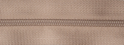 Roll of fawn continuous nylon zip with sliders