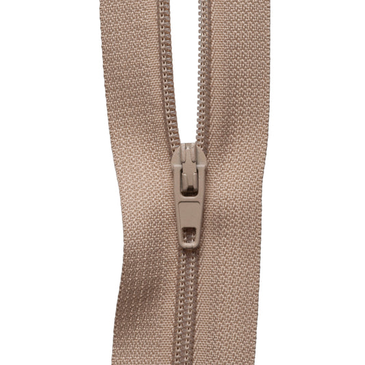 Roll of fawn continuous nylon zip with sliders