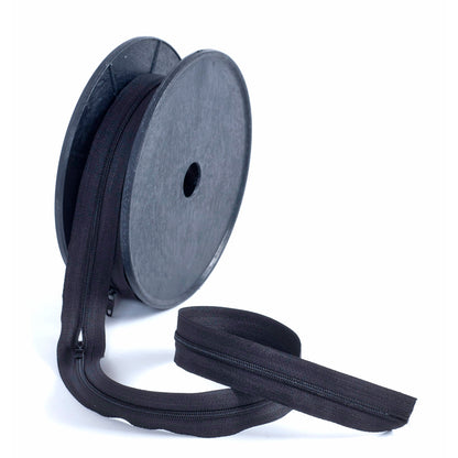 Roll of black continuous nylon zip with sliders