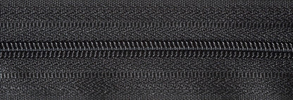 Roll of black continuous nylon zip with sliders