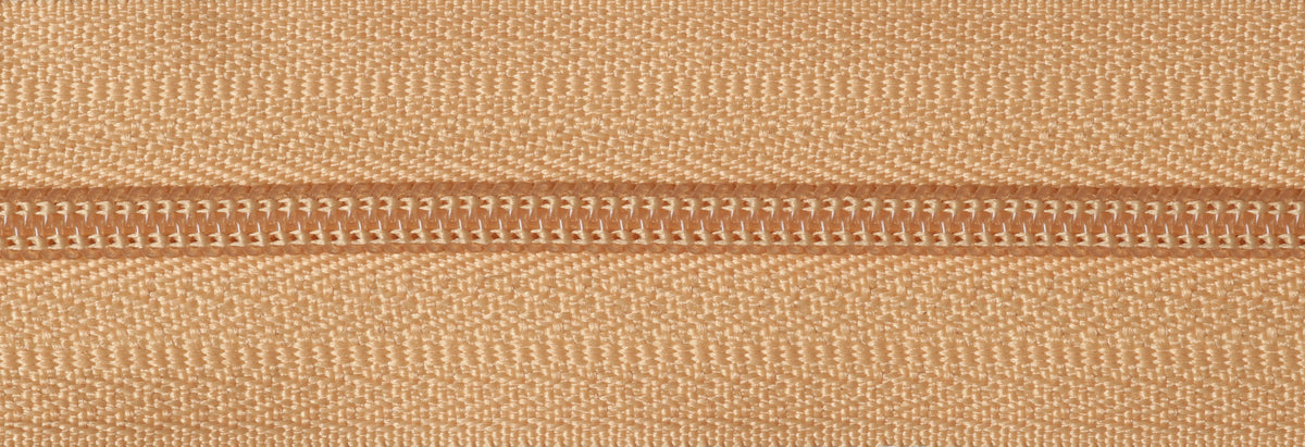 Roll of gold continuous nylon zip with sliders