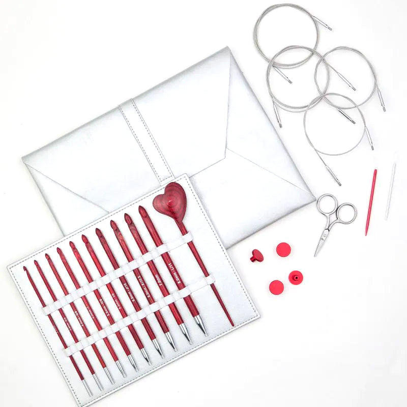 KnitPro Amore interchangeable Tunisian crochet hook set laid out in its case