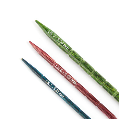 Three KnitPro Dreamz straight wooden cable needles