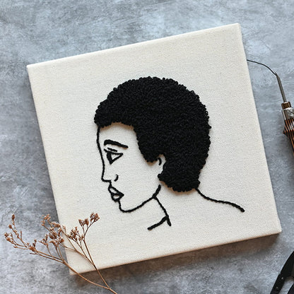 Two square wooden frames with pre-stretched punch needle fabric
