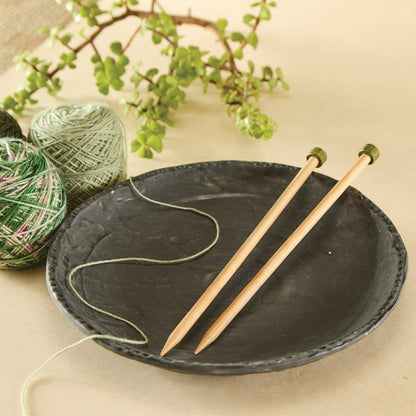 Pair of KnitPro 3.25mm bamboo single pointed knitting needles with green end caps