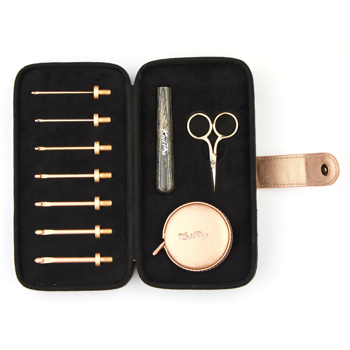 KnitPro Oasis starter crochet hook set with rose gold heads and grey onyx handle in a black faux suede case