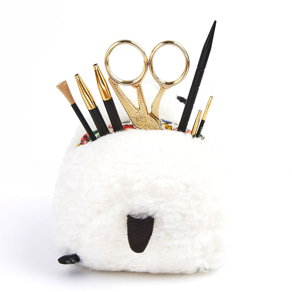 Padded sheep-shaped accessories holder