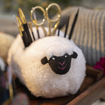 Padded sheep-shaped accessories holder