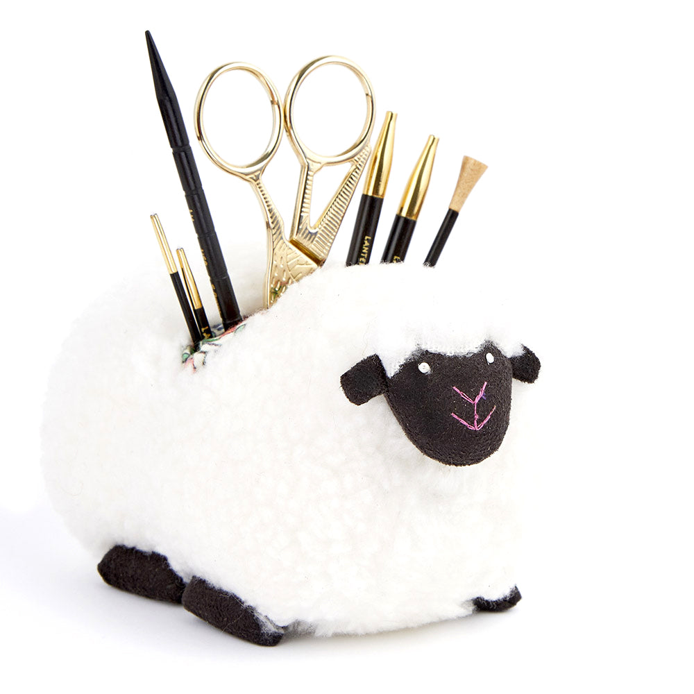Padded sheep-shaped accessories holder