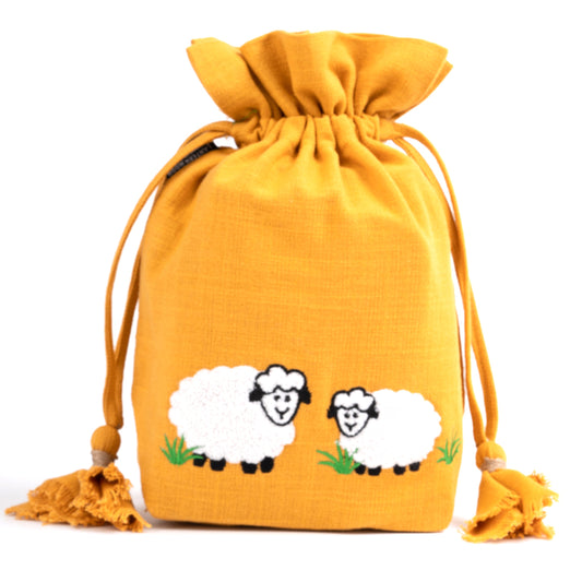 Mustard cotton drawstring bag with two embroidered sheep