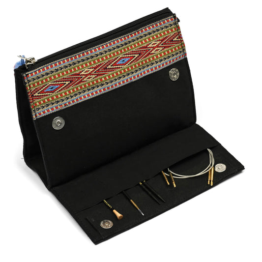 Black canvas zip case with woven band and pom pom