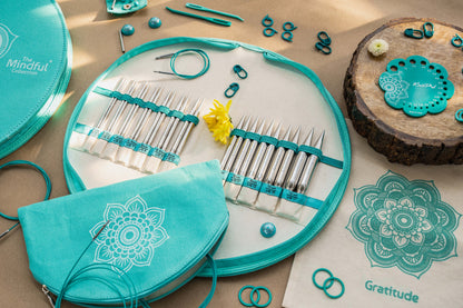KnitPro Mindful Warmth interchangeable needle set in a semi-circular mandala fabric case