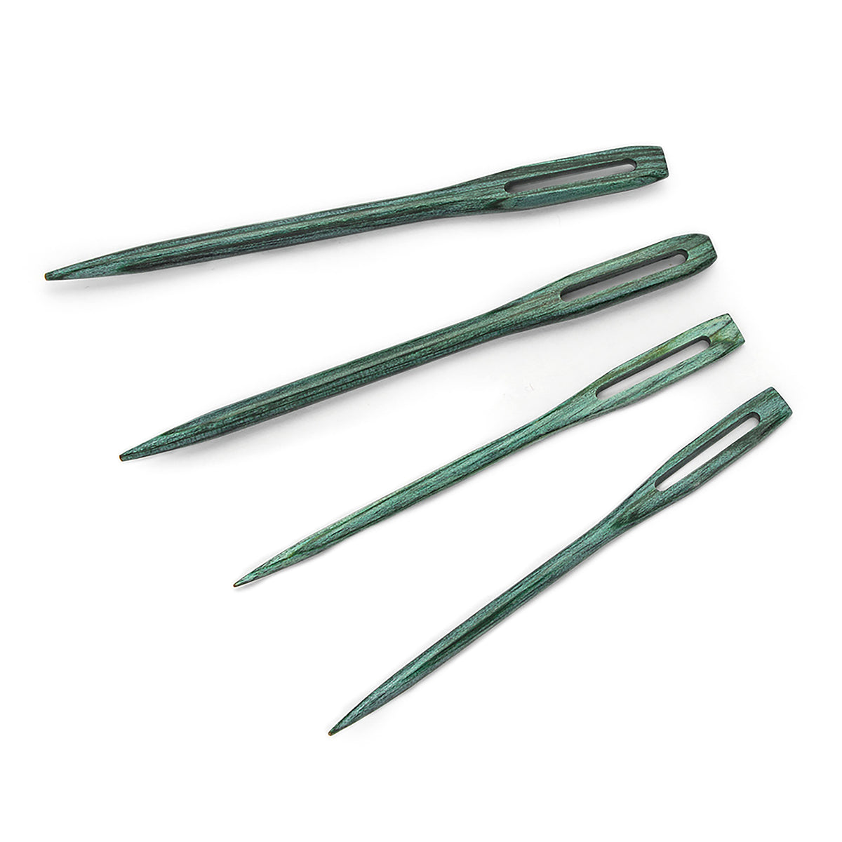 Four teal wooden darning needles beside a round wooden case
