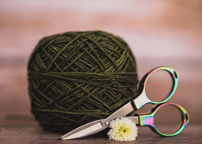 Rainbow finish folding scissors with a drawstring pouch