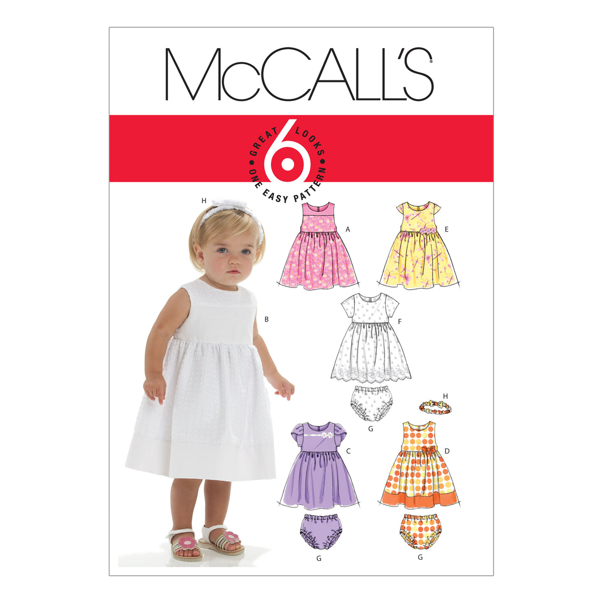 McCall's M6015 pattern envelope showing baby dresses