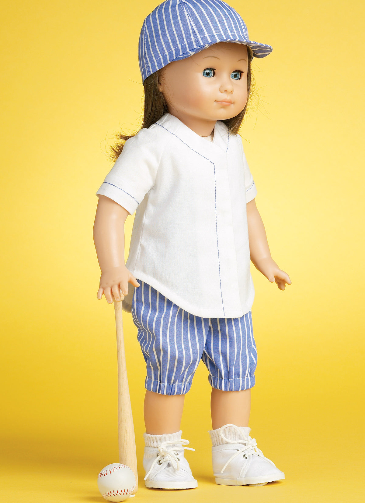 McCall's M6137 pattern envelope showing doll clothes