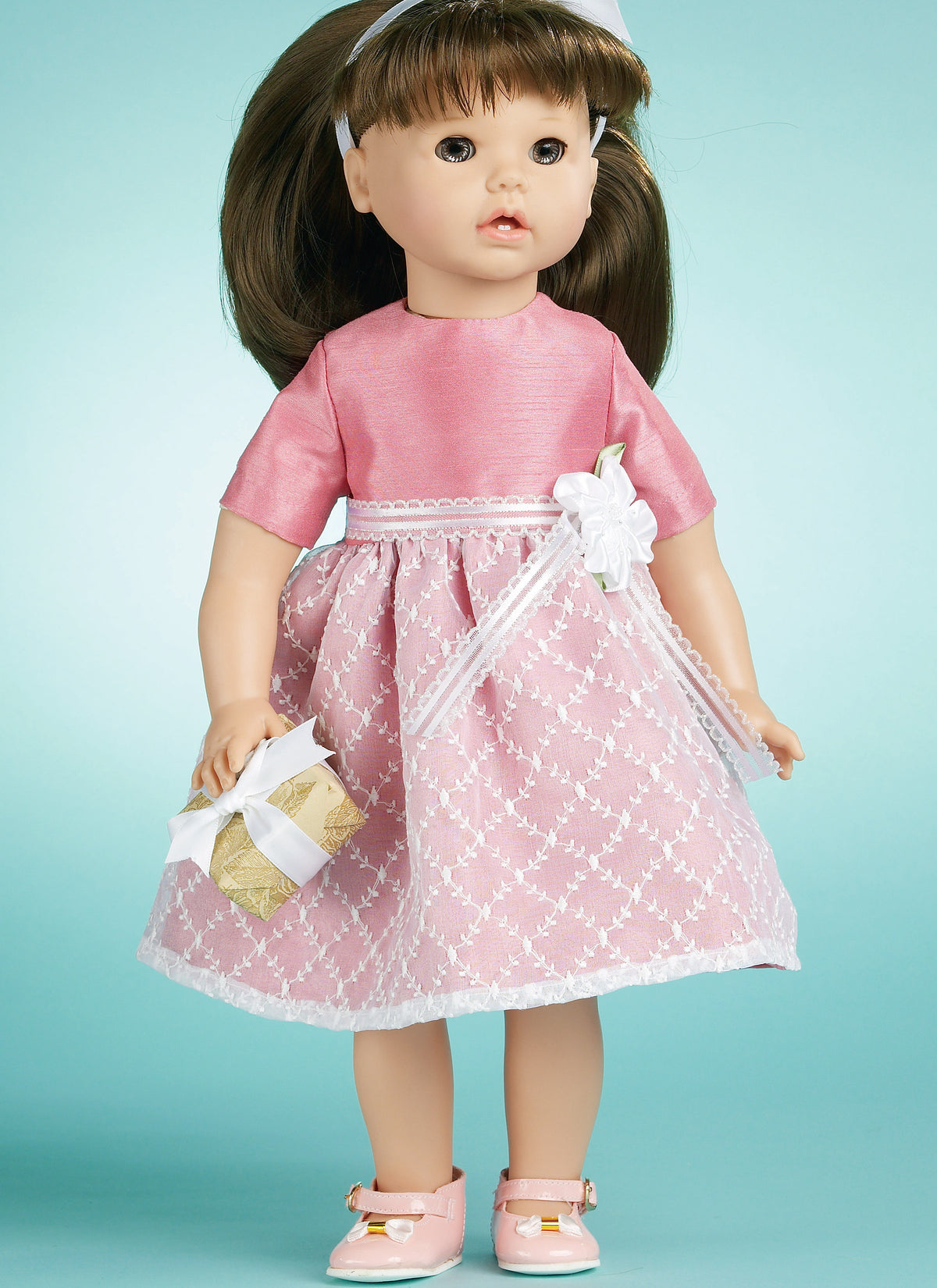 McCall's M6137 pattern envelope showing doll clothes