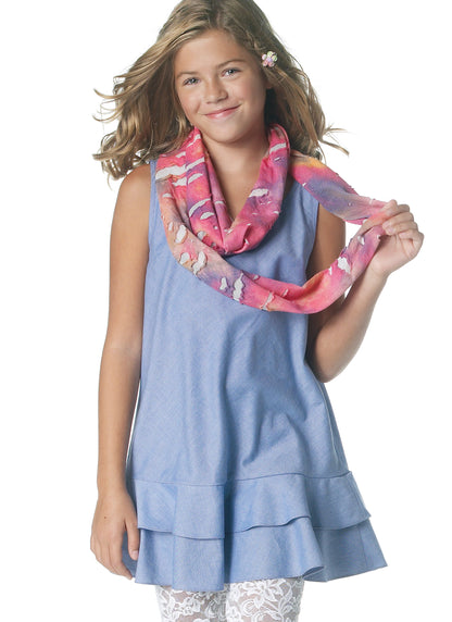 McCall's M6275 pattern envelope showing girls' tunics, dresses, leggings and scarf