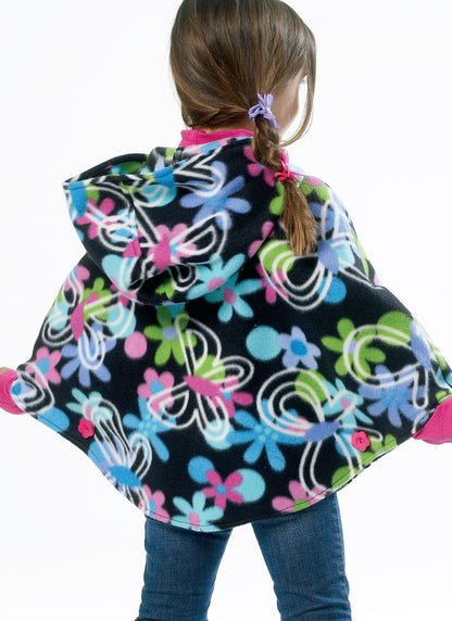 McCall's M6431 pattern envelope showing girls' ponchos