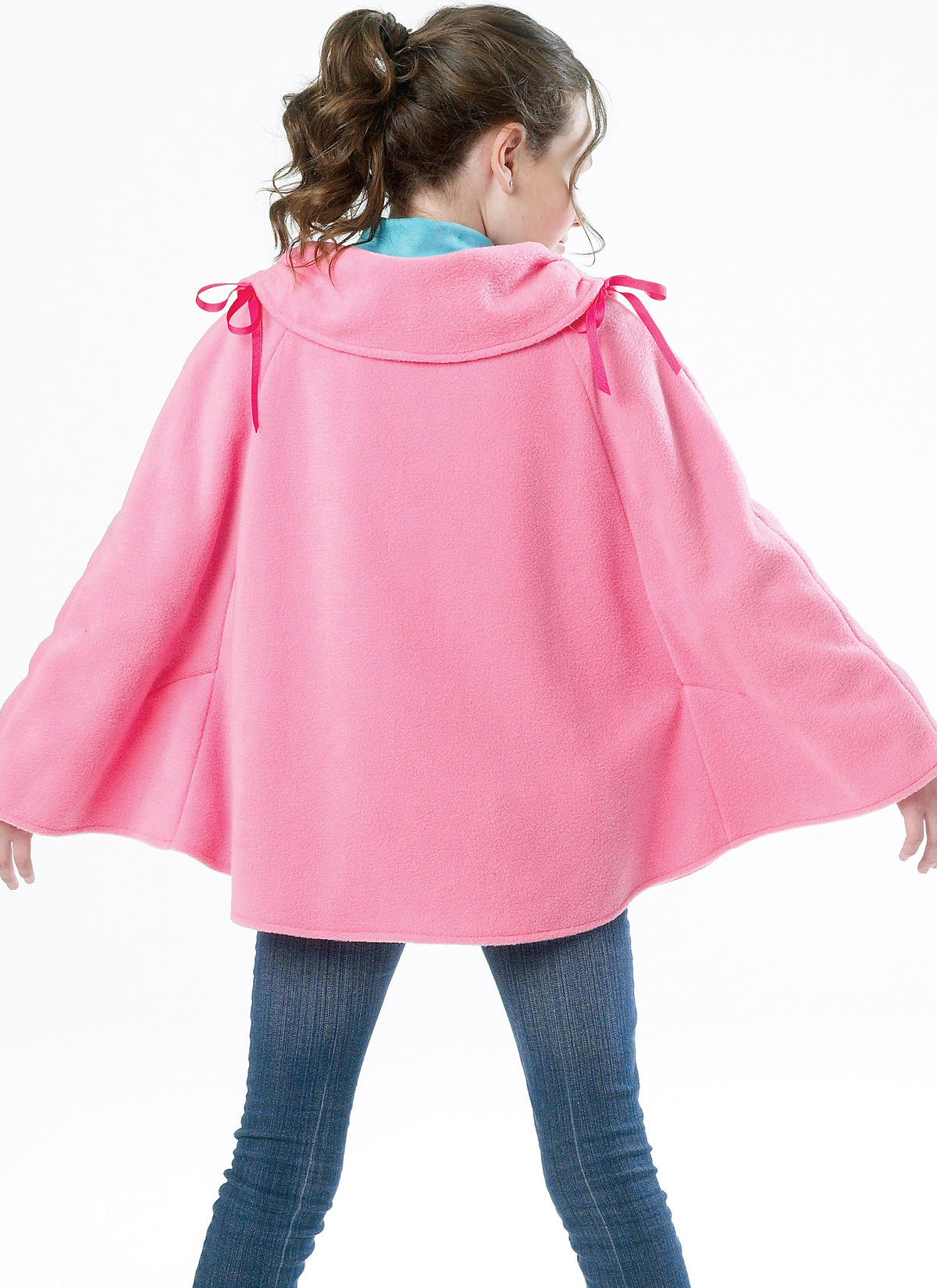 McCall's M6431 pattern envelope showing girls' ponchos
