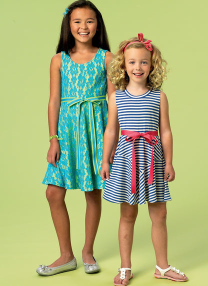 McCall's M6915 sewing pattern envelope showing girls' pullover dress
