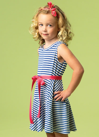 McCall's M6915 sewing pattern envelope showing girls' pullover dress