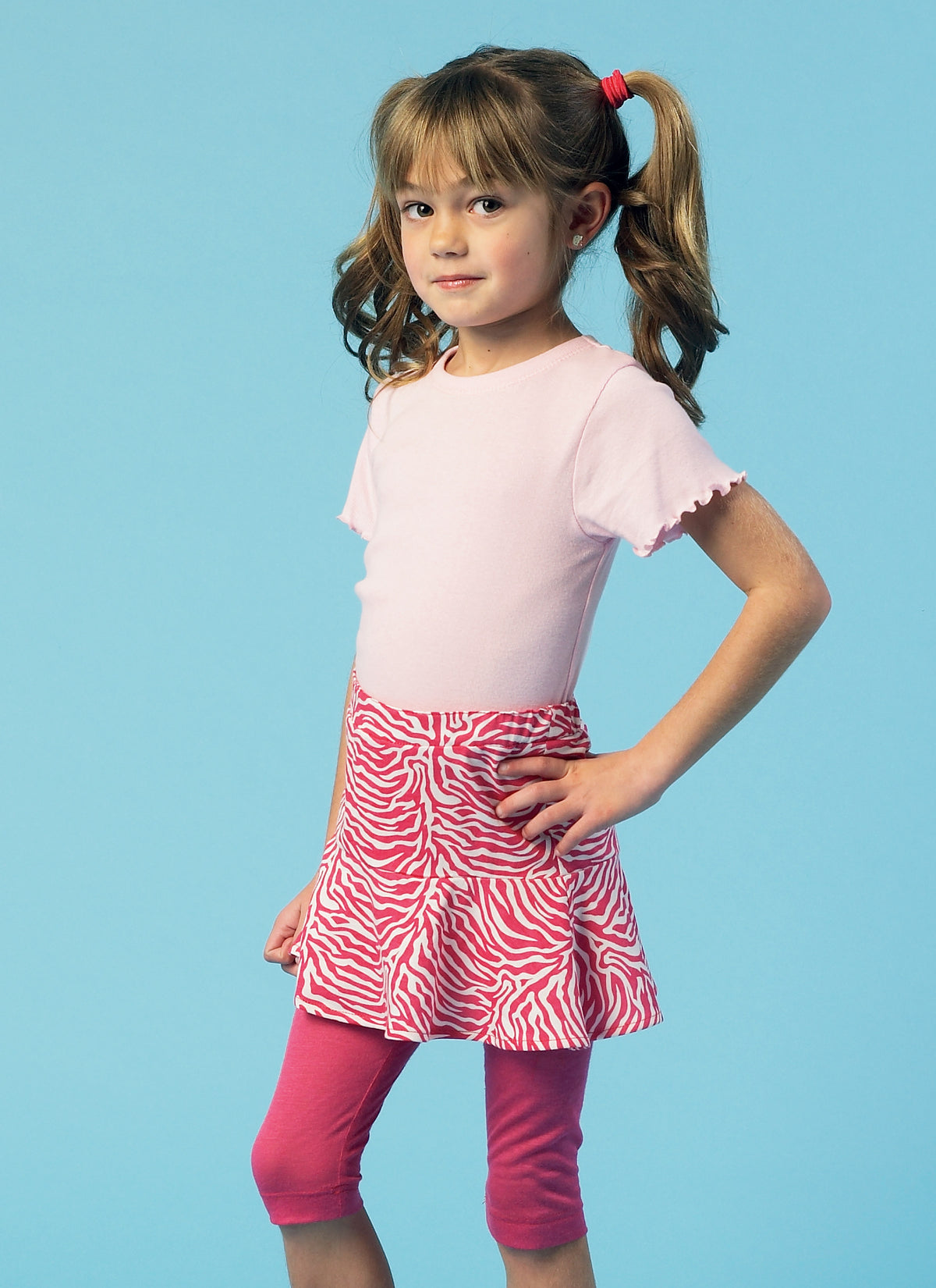 McCall's M6918 sewing pattern envelope showing girls' skorts