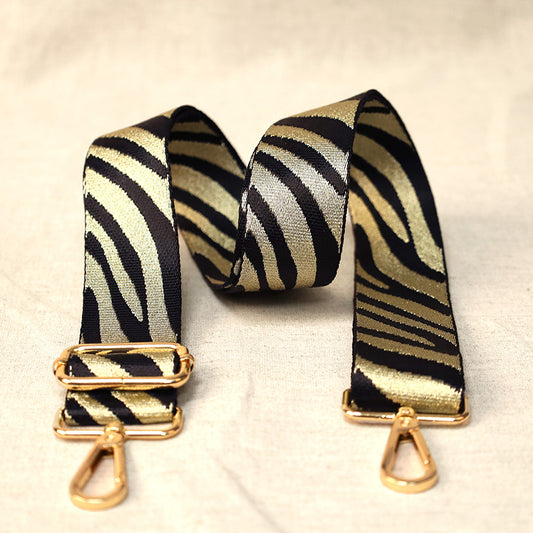 Shiny tiger print bag shoulder strap with metal fastenings