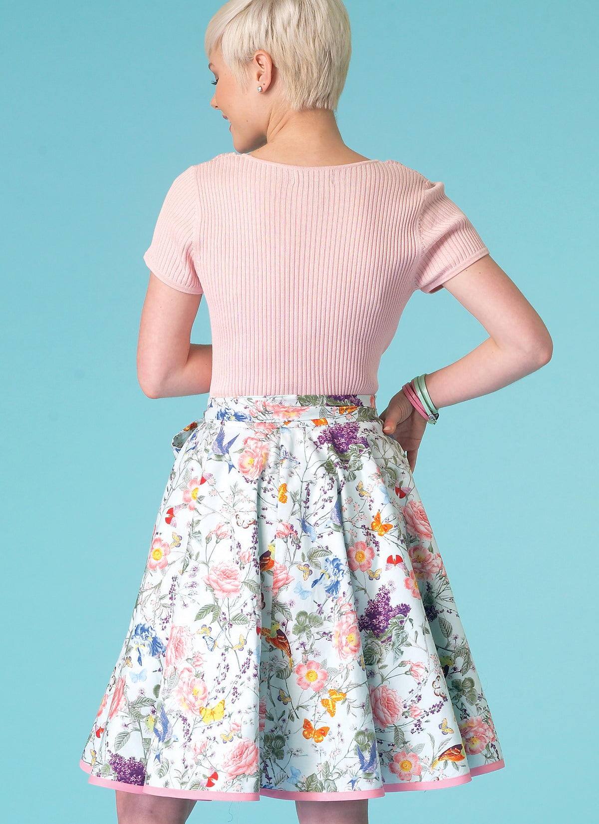 McCall's M7129 sewing pattern envelope showing wrap skirt designs