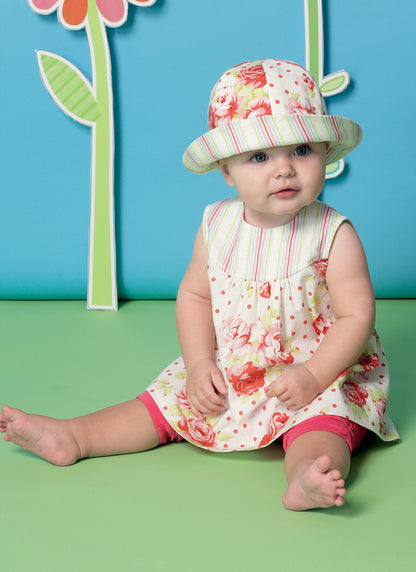 McCall's M7342 sewing pattern envelope showing sleeveless baby dresses