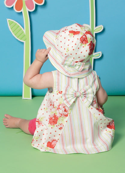 McCall's M7342 sewing pattern envelope showing sleeveless baby dresses