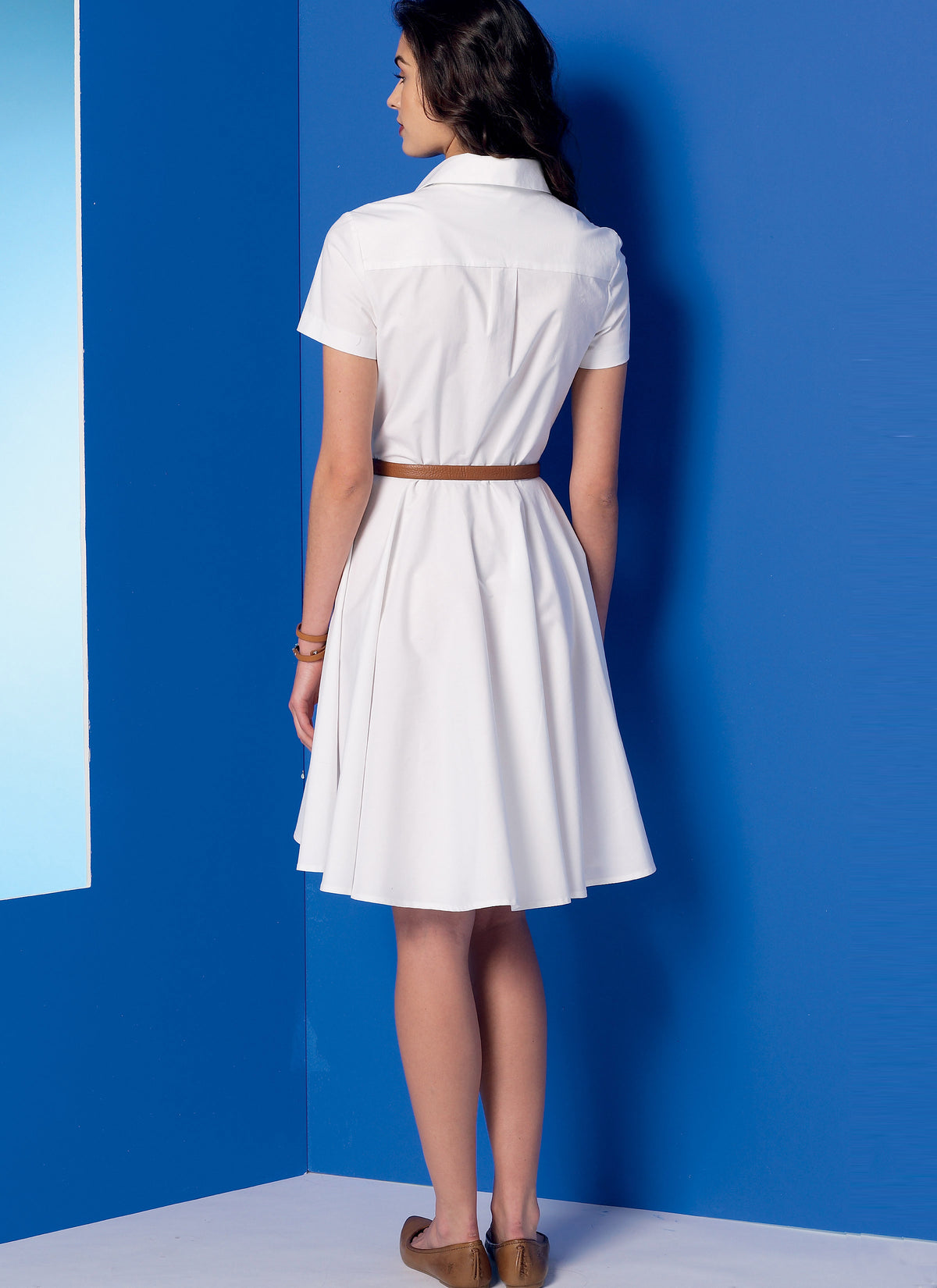 McCall's M7351 sewing pattern envelope showing dresses with a pointed collar