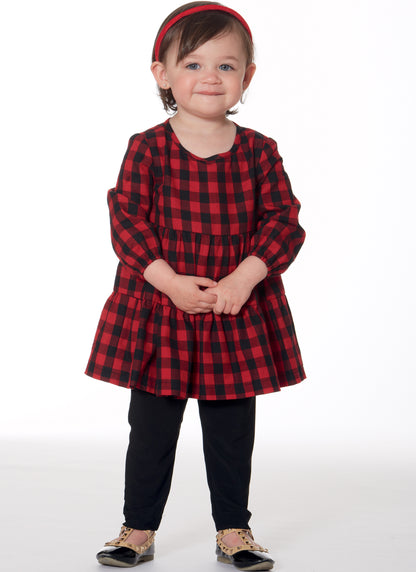 McCall's M7458 sewing pattern envelope showing pullover tops and dresses
