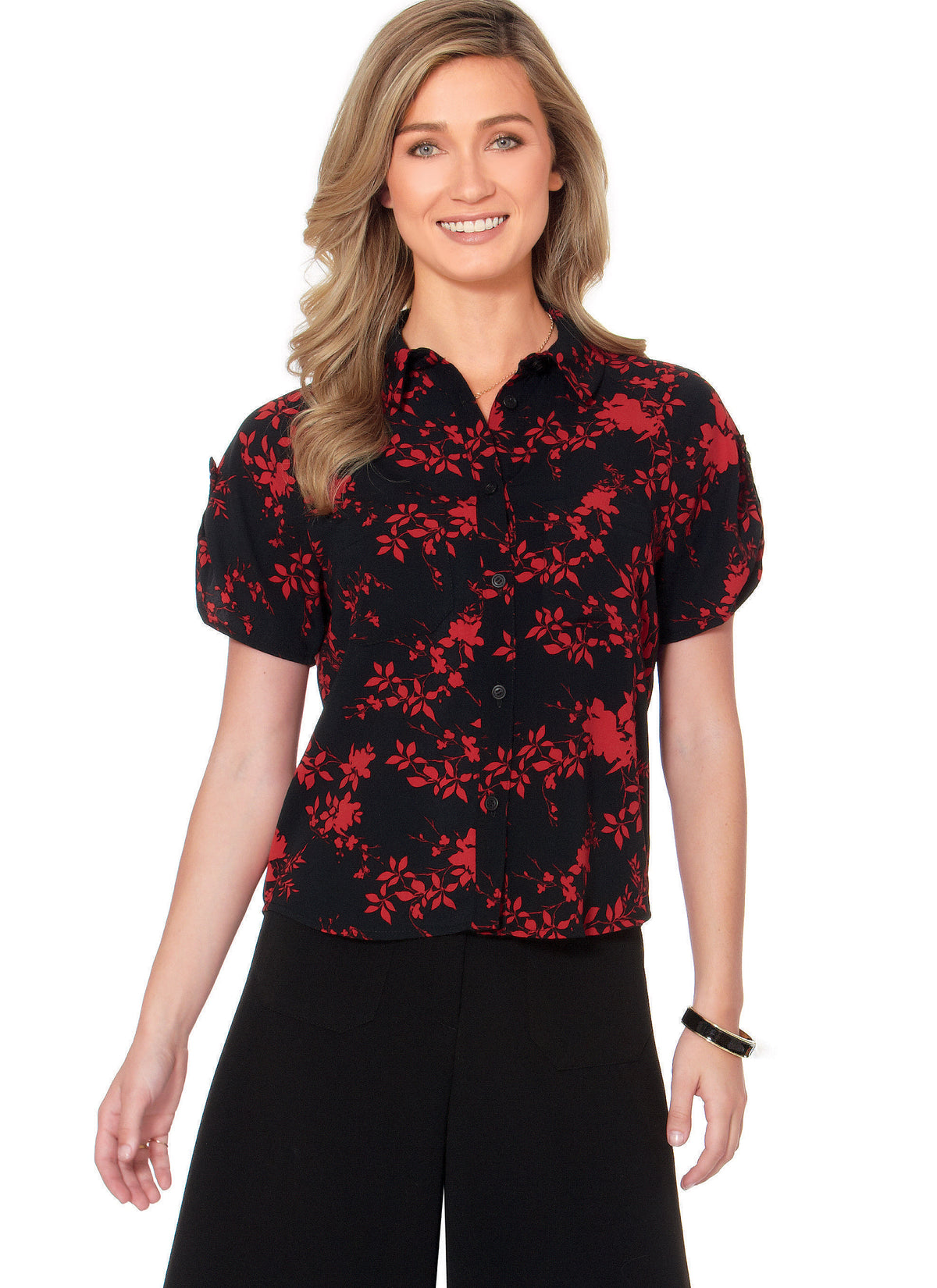 McCall's M7472 sewing pattern envelope showing loose-fitting button-front shirts and tunics