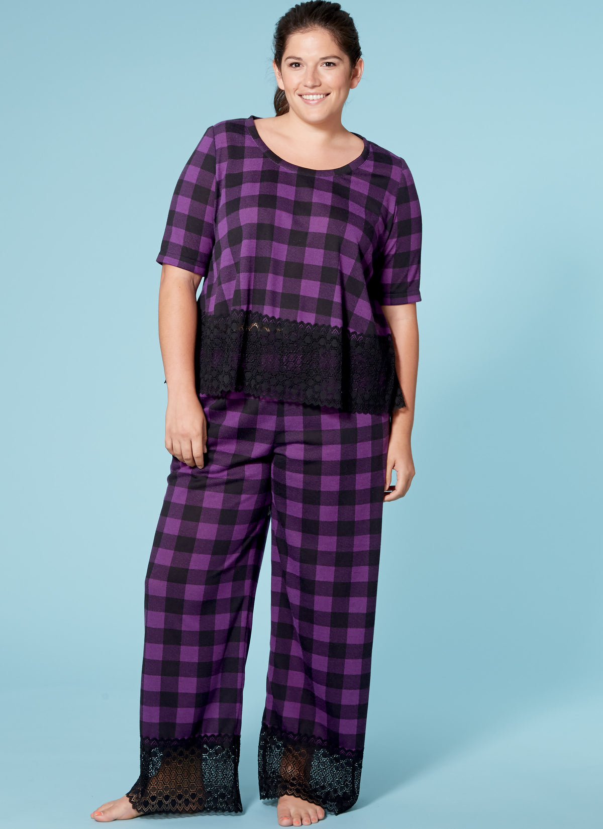 McCall's M7697 sewing pattern envelope showing fitted tops and dress designs