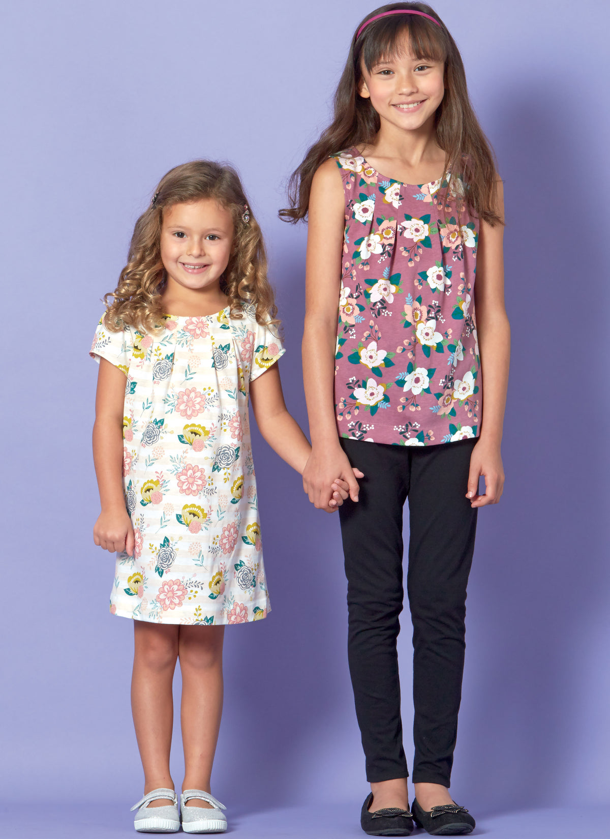 McCall's M7709 sewing pattern envelope for the girls' tops and dresses