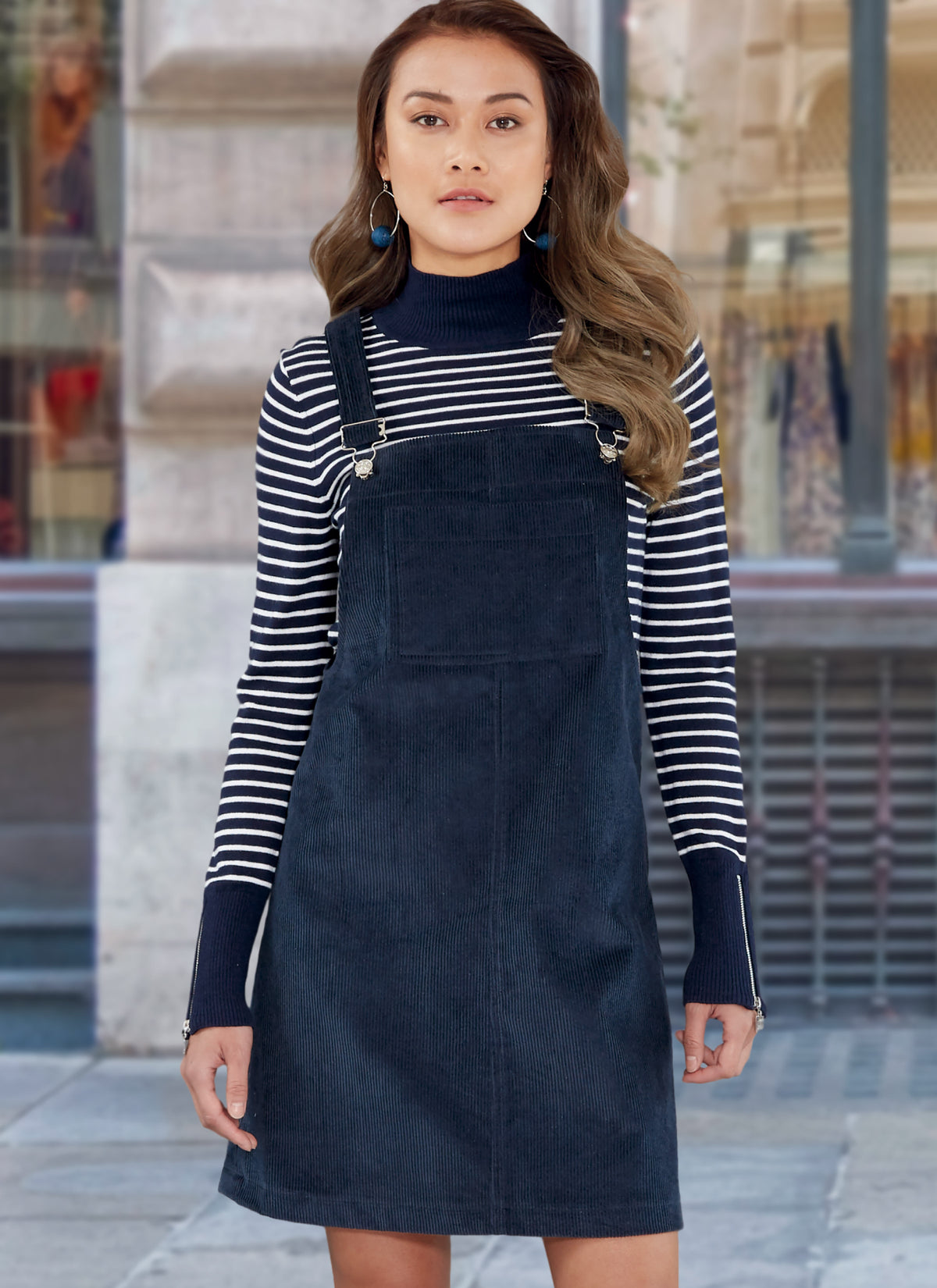 McCall's M7831 sewing pattern envelope showing pinafore dress designs