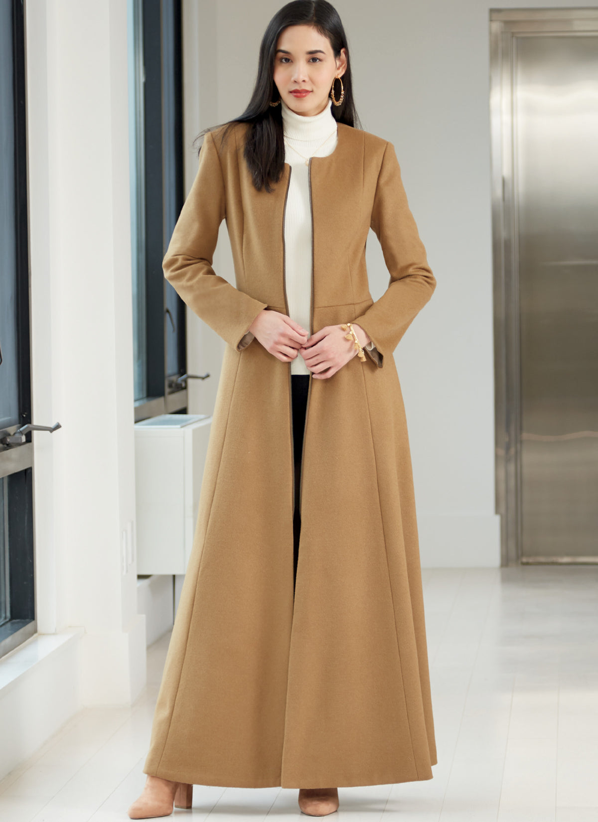 McCall's M7848 sewing pattern envelope showing plus size lined coat designs