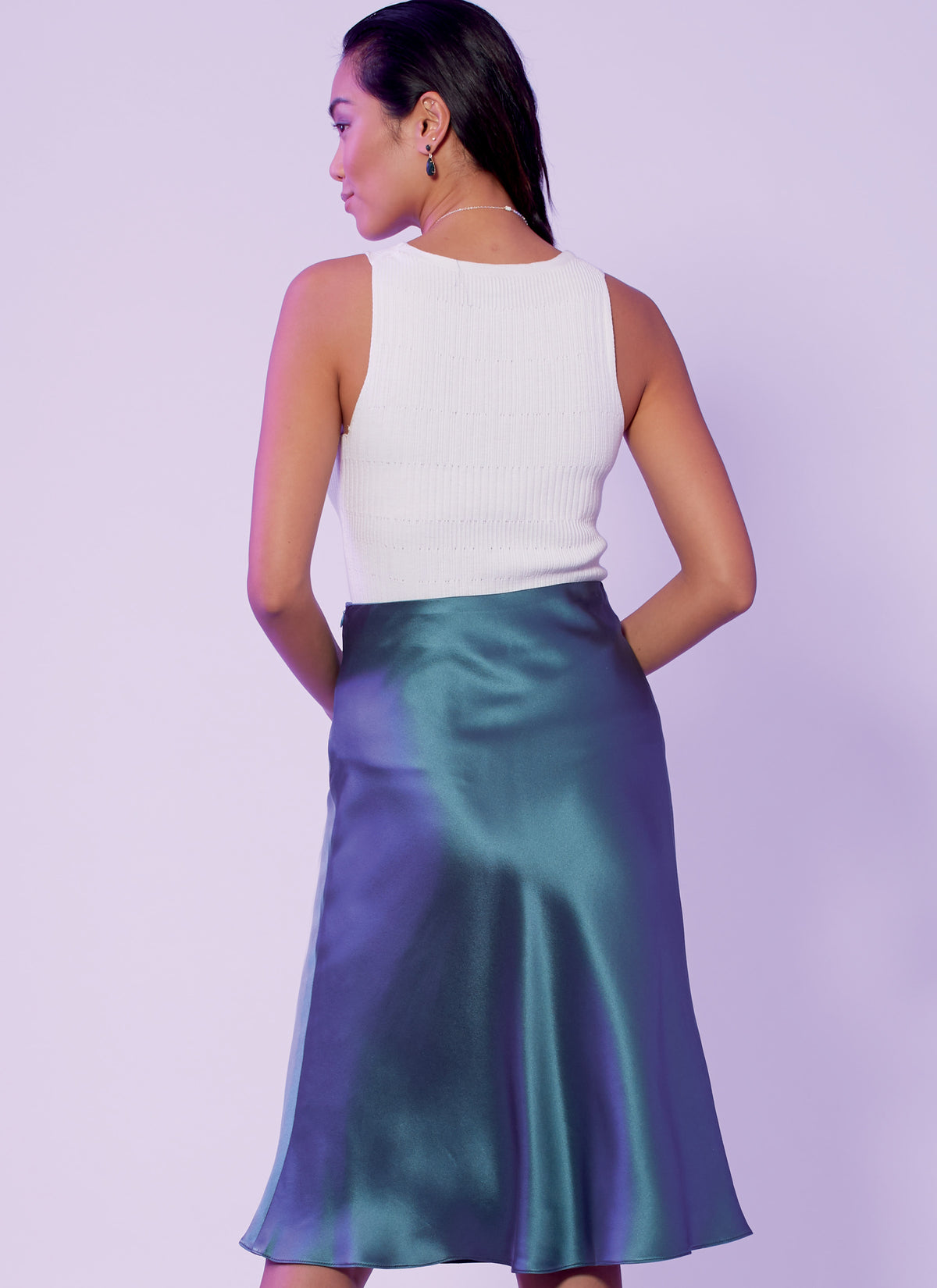 McCall's M7931 sewing pattern envelope showing fitted skirt designs
