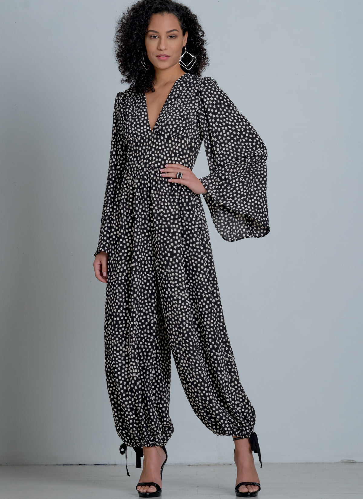 McCall's M8009 sewing pattern envelope showing jumpsuit and romper