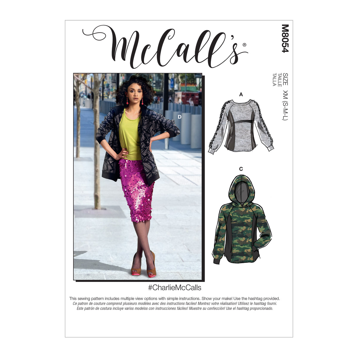McCall's M8054 sewing pattern envelope showing unisex pullover top designs