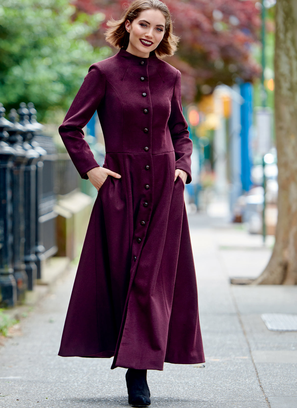 McCall's M8156 sewing pattern envelope showing the fit & flare princess seam coat designs