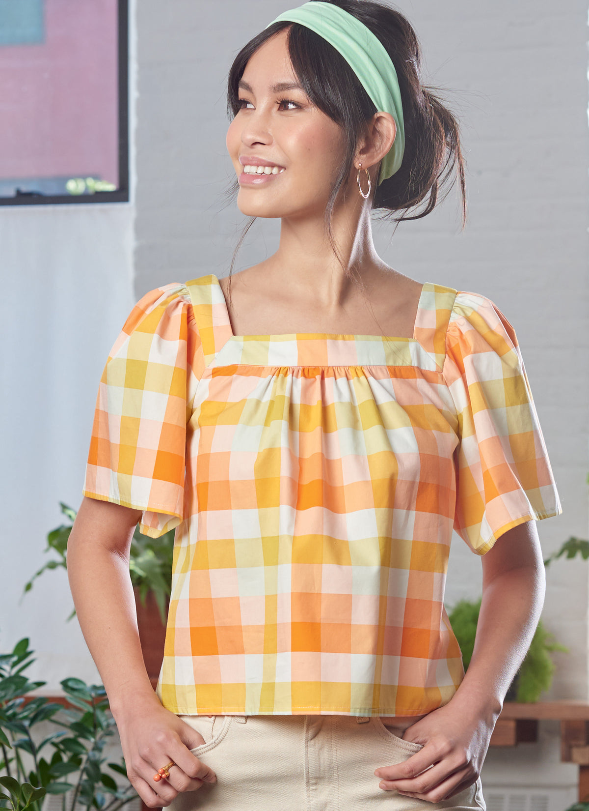 McCall's M8202 sewing pattern envelope showing a square neck top