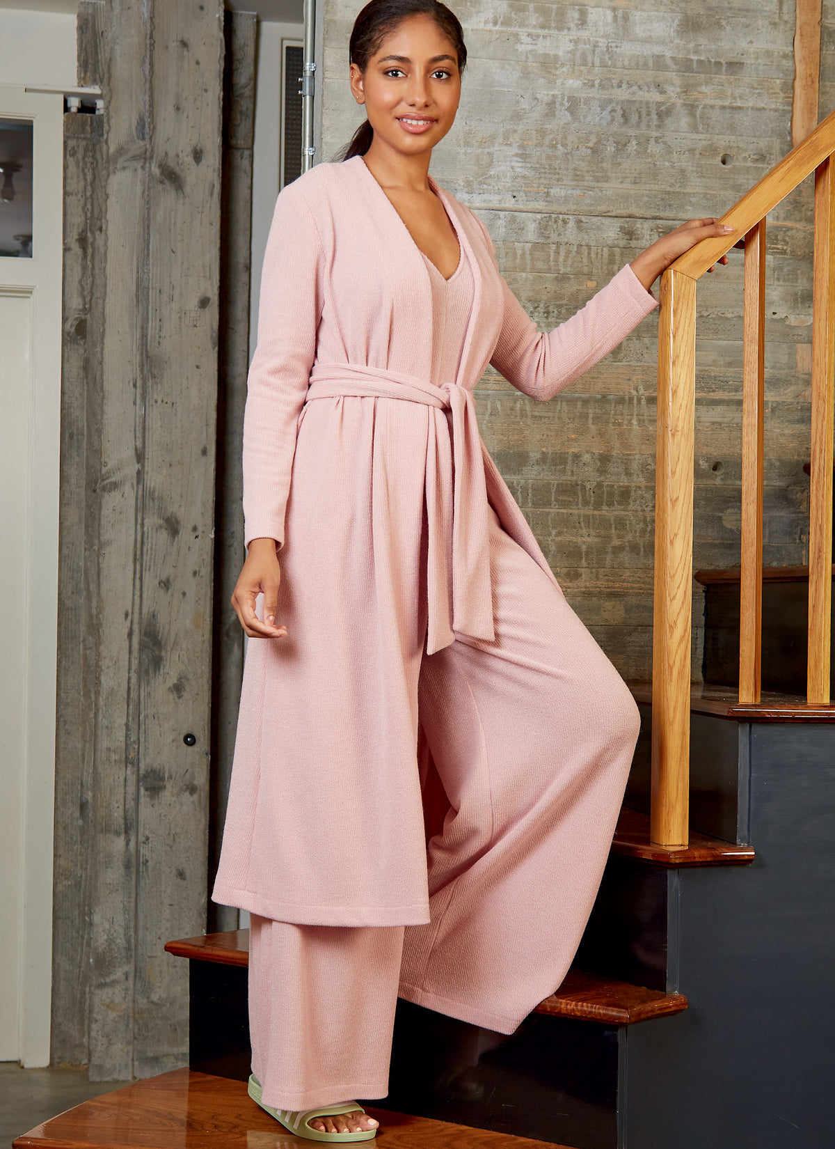 McCall's M8245 sewing pattern envelope showing V-neck romper and jumpsuit designs
