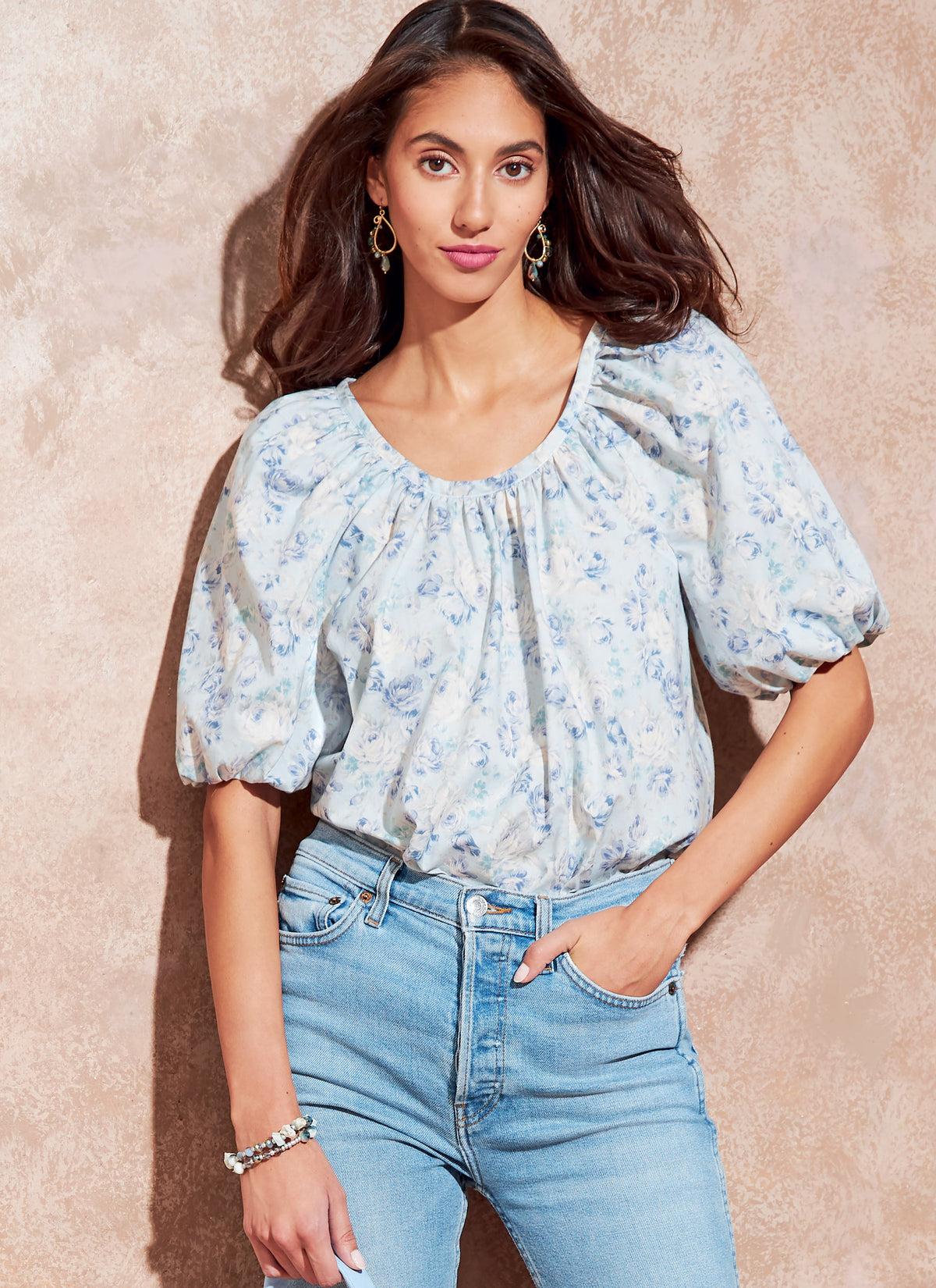 McCall's M8256 sewing pattern envelope showing raglan sleeve top designs