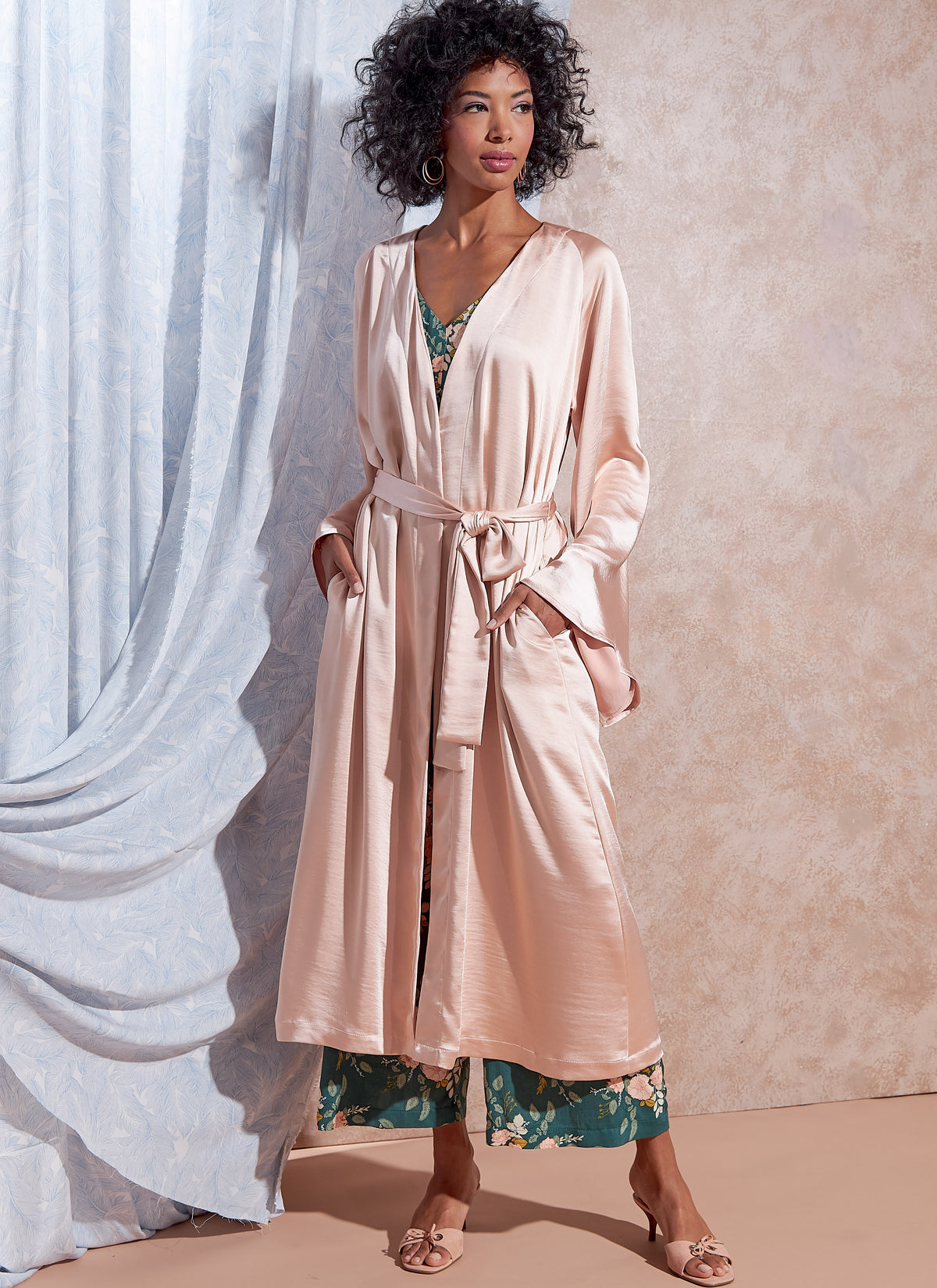 McCall's M8261 sewing pattern envelope showing romper and wide leg jumpsuit designs
