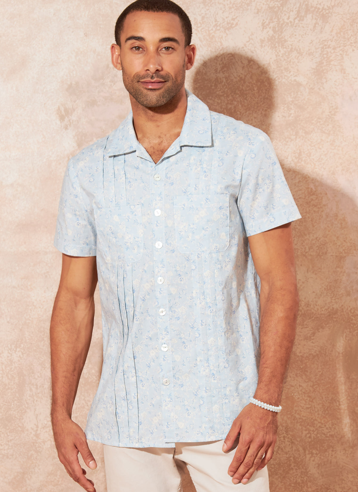 McCall's M8263 sewing pattern envelope showing a relaxed unisex camp shirt