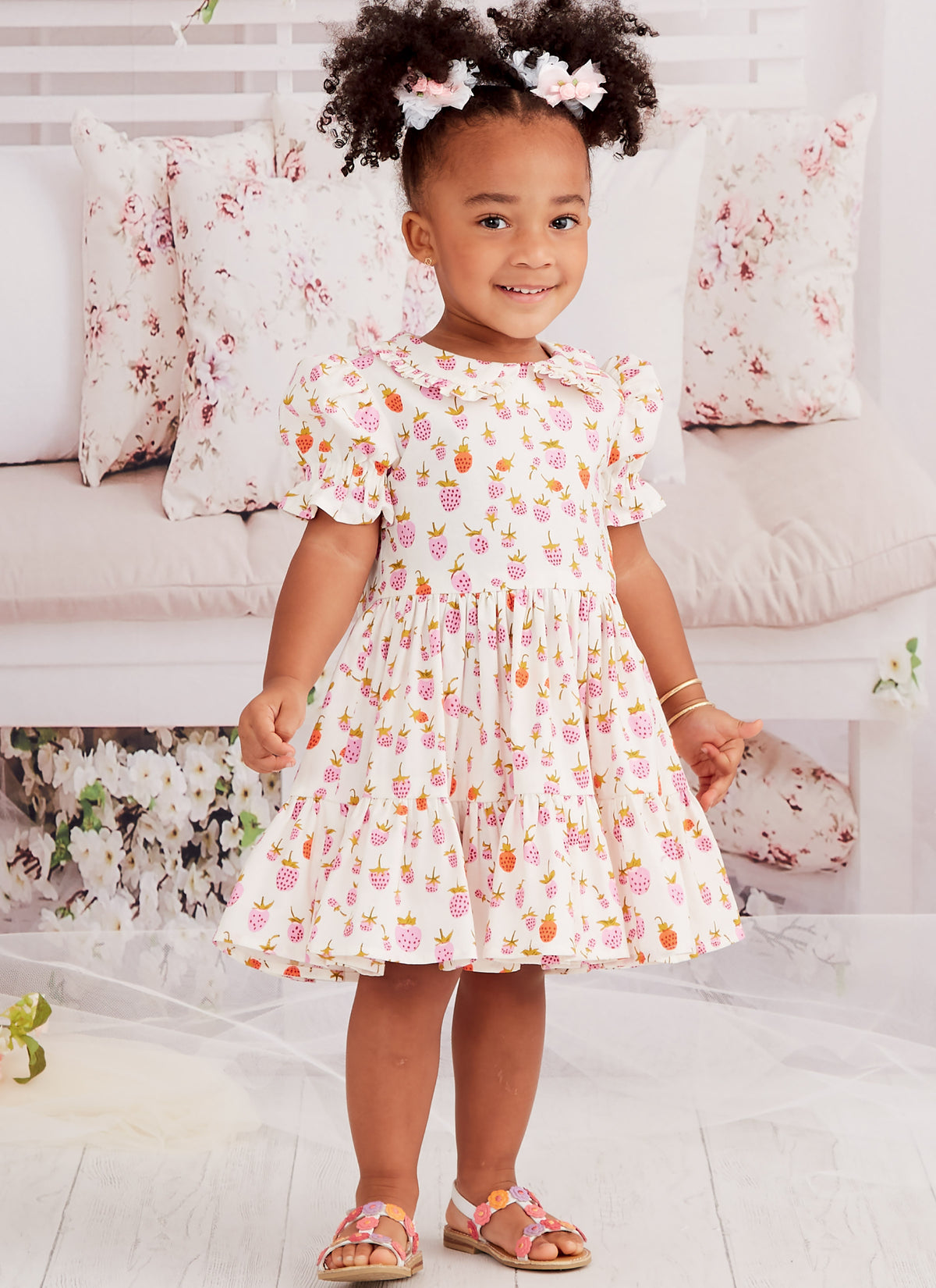McCall's M8266 sewing pattern envelope showing fit-and-flare toddler dresses